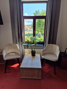 Posedenie v ubytovaní Apartamenty Amadeus