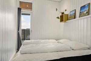 Ένα ή περισσότερα κρεβάτια σε δωμάτιο στο 1314-Thisted-Lyngbakken-14