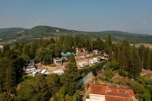 an aerial view of a campground in a forest at Camping Village Panoramico Fiesole in Fiesole