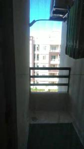 a window in a room with a view of a building at VIP Chalet at JULIANA North coast جوليانا الساحل الشمالي in Dawwār Muşādif Yūnus +9 photos