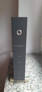 a black remote control sitting on top of a counter at Privat Appartement R D-2 in Bruchköbel