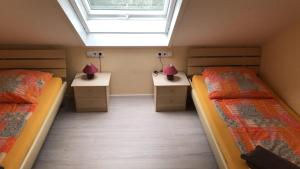 Postel nebo postele na pokoji v ubytování Ferienwohnung Karin