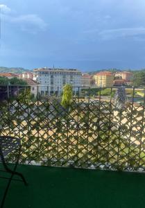 a view of a city from a window at Appartamento Lella Acqui terme zona corso bagni in Acqui Terme