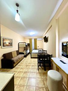 Llit o llits en una habitació de Hotel Asteri