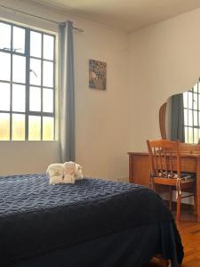 Postel nebo postele na pokoji v ubytování Villa Trois Cocos