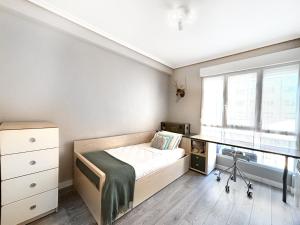 En eller flere senge i et værelse på Luxury San Prudencio Vitoria