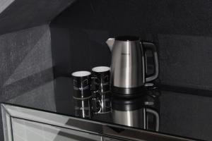 a coffee pot sitting on top of a counter at Mala Porta in Trogir