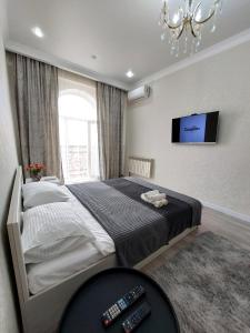 En eller flere senge i et værelse på Top Level House