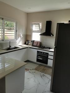 Køkken eller tekøkken på Heritage Community Aida