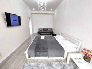 En eller flere senge i et værelse på Top Level House + 98 billeder