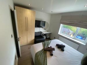 TV a/nebo společenská místnost v ubytování Quiet North London - 2 x Double Bedrooms - Close to Station and 20mins Central London