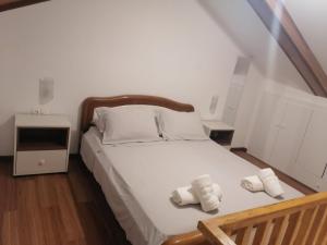 En eller flere senge i et værelse på La Casa di Levante