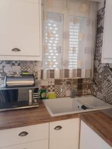 Køkken eller tekøkken på La Casa di Levante + 9 billeder