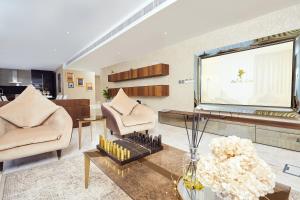 Posezení v ubytování Bel Air Crest Hotel & Suites