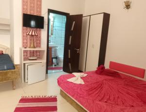 Postel nebo postele na pokoji v ubytování Samaya + 1 fotografie