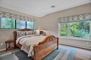 Ένα ή περισσότερα κρεβάτια σε δωμάτιο στο Classic Quogue Family Home +12 φωτογραφίες
