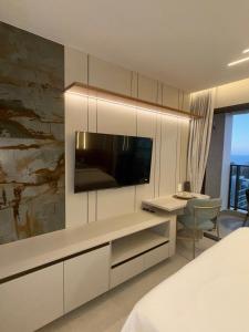 Μια τηλεόραση ή/και κέντρο ψυχαγωγίας στο Flat Beachclass Meireles studios