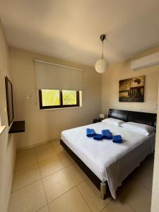 Ένα ή περισσότερα κρεβάτια σε δωμάτιο στο Villa Sotmarie