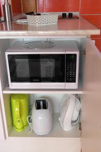 A kitchen or kitchenette at Halkoz Apartment