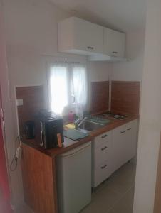 Una cocina o cocineta en Studio à deux pas de Monaco