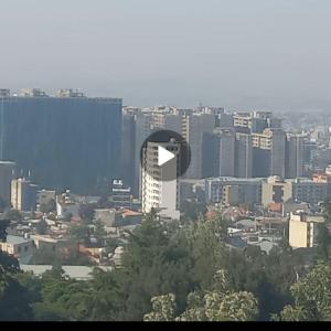 a view of a city with a tall building at Panorama Housing Estate in Addis Ababa