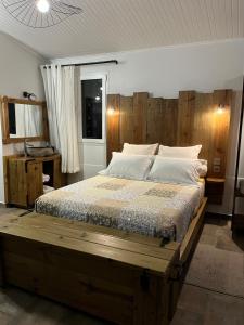 En eller flere senge i et værelse på Le petit Nénuphar