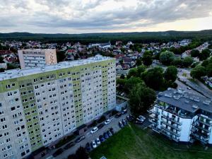 an aerial view of a large building in a city at Cozy Nest Apartment in Świnoujście