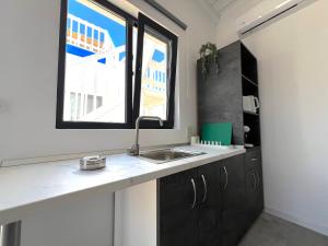 Køkken eller tekøkken på Costinesti Greek Bungalows