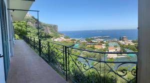 a balcony with a view of the ocean at Seventy Steps in Vico Equense
