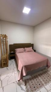 Postel nebo postele na pokoji v ubytování Pousada Porto de Paz - Noronha