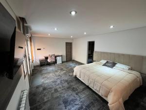 Ένα ή περισσότερα κρεβάτια σε δωμάτιο στο Hotel Alto Center +70 φωτογραφίες