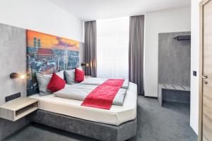 Postel nebo postele na pokoji v ubytování Rimedya Hotel - an der Messe München
