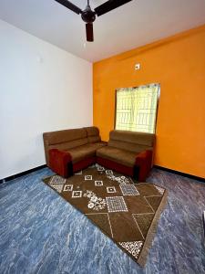Posezení v ubytování 1bhk Corner Stay by Shivalaya