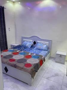 Postel nebo postele na pokoji v ubytování Appartement meublé à Dakar
