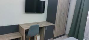 TV a/nebo společenská místnost v ubytování Grancara house