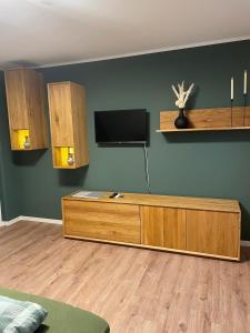 TV a/nebo společenská místnost v ubytování Fewo Haus Peters "De Lütte" + 2 fotografie