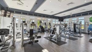 a gym with treadmills and elliptical machines at Landing at Marisol at Viera - Melbourne in Viera