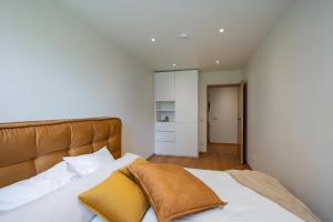 Ένα ή περισσότερα κρεβάτια σε δωμάτιο στο Cozy 2-bedroom apartment with sauna