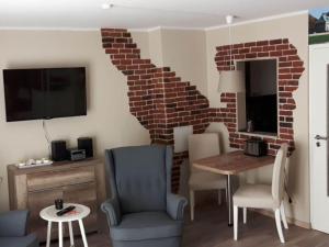 TV a/nebo společenská místnost v ubytování Kruspe Comfortable holiday residence