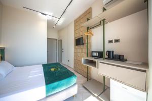 Postel nebo postele na pokoji v ubytování Hotel Royal