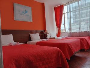Hotel Bogota客房内的一张或多张床位