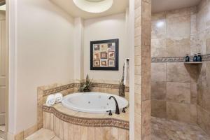 a bathroom with a tub and a shower at Red Cliffs - Scenic Tranquility in Washington
