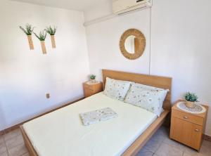 Ein Bett oder Betten in einem Zimmer der Unterkunft Villa Dusper