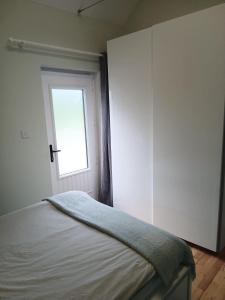 Postel nebo postele na pokoji v ubytování Port Omna Ciúin