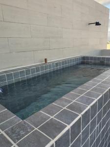 Bazén v ubytování Canto Ciigarra VI - Bessa - João Pessoa - PB nebo v jeho okolí