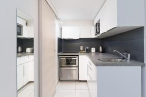 Kuchyň nebo kuchyňský kout v ubytování Modern 2 Rooms in the heart of Cannes