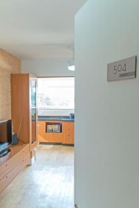 Μια τηλεόραση ή/και κέντρο ψυχαγωγίας στο Loft Alto Padrão - Santo Amaro