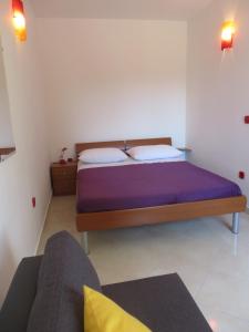 Postel nebo postele na pokoji v ubytování Apartments Luka