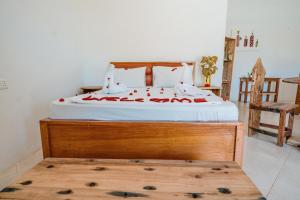 Un pat sau paturi într-o cameră la Bella Vista Resort Zanzibar