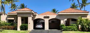 a house with a car parked in front of it at Romantic Studio in Waikoloa Beach Resort in Waikoloa